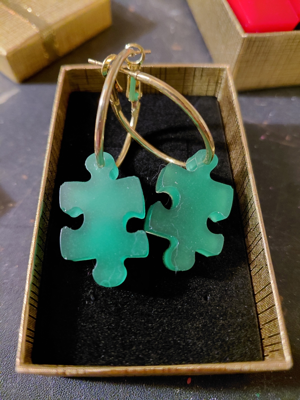 Gold Hoop Earrings with Green Puzzle Piece Charms